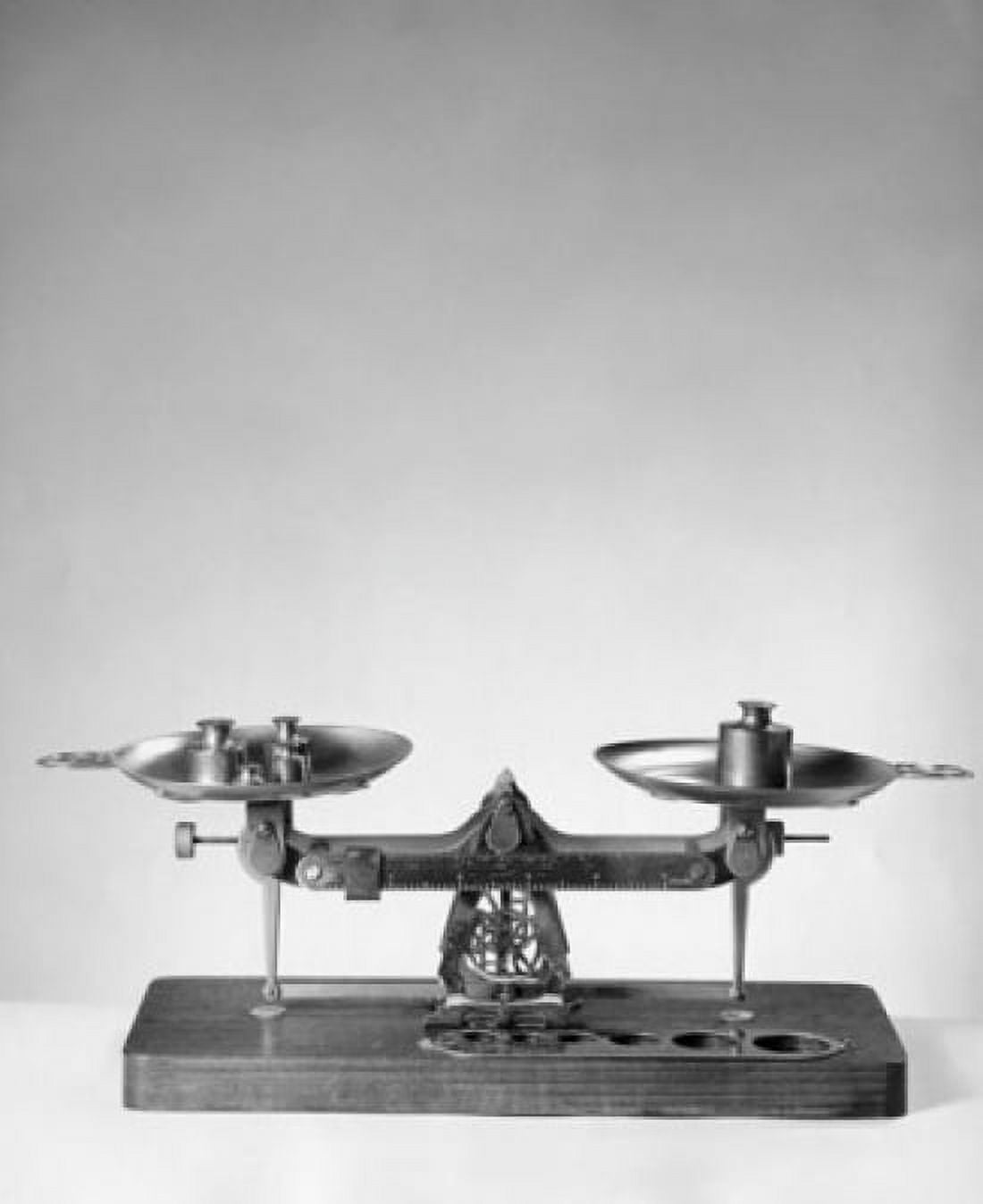 Weights on a weighing scale Canvas Art - (24 x 36)