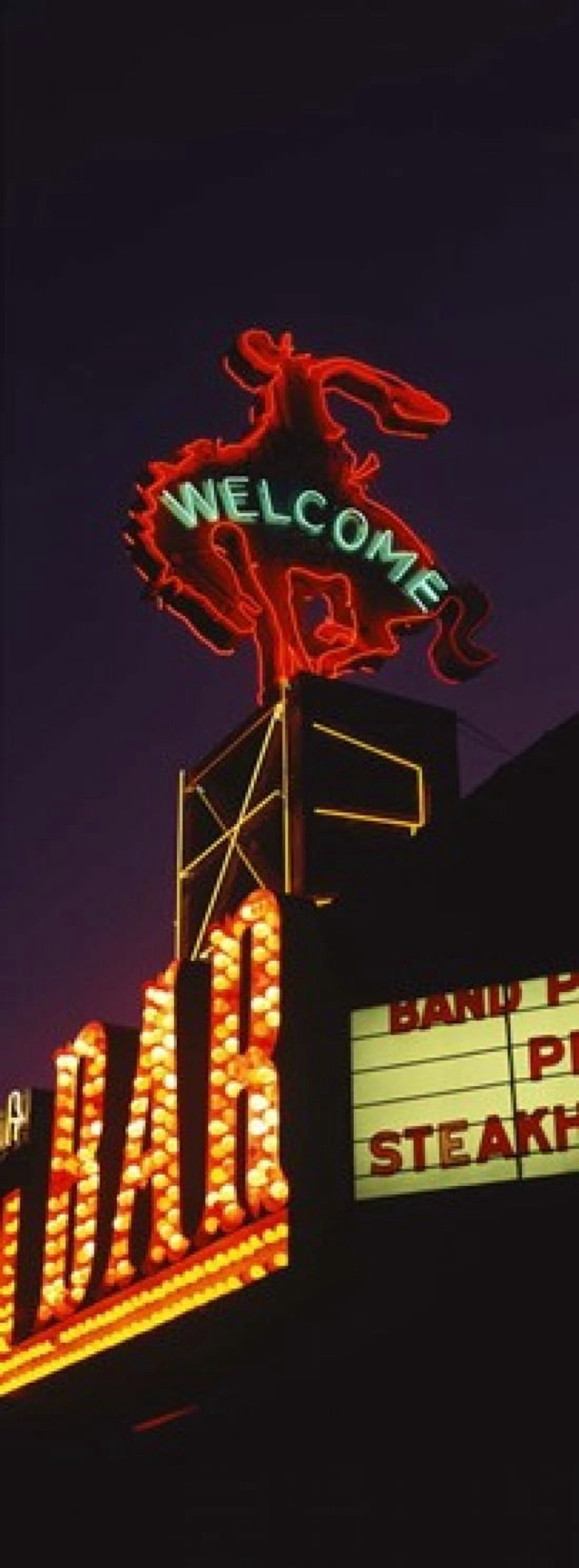Welcome sign of a bar Million Dollar Cowboy Bar Jackson Jackson Hole Teton County Wyoming USA Canvas Art - Panoramic Images (18 x 7)