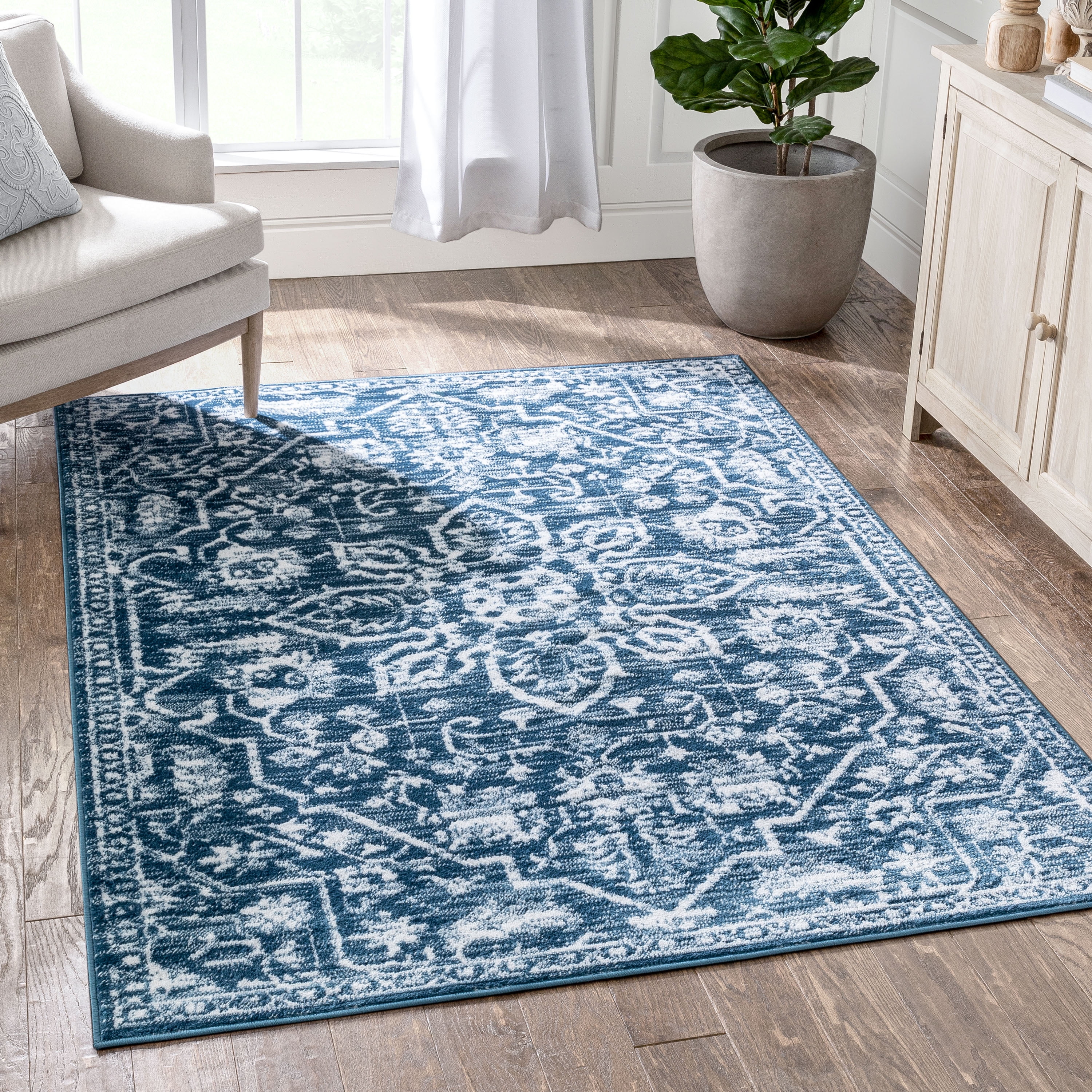 Light Blue Floral Synthetic Reversible 5' x 7' Rug