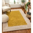 thumbnail image 1 of Well Woven Madison Shag Cozumel Modern Border Gold 5' x 7'2" Thick Area Rug, 1 of 6