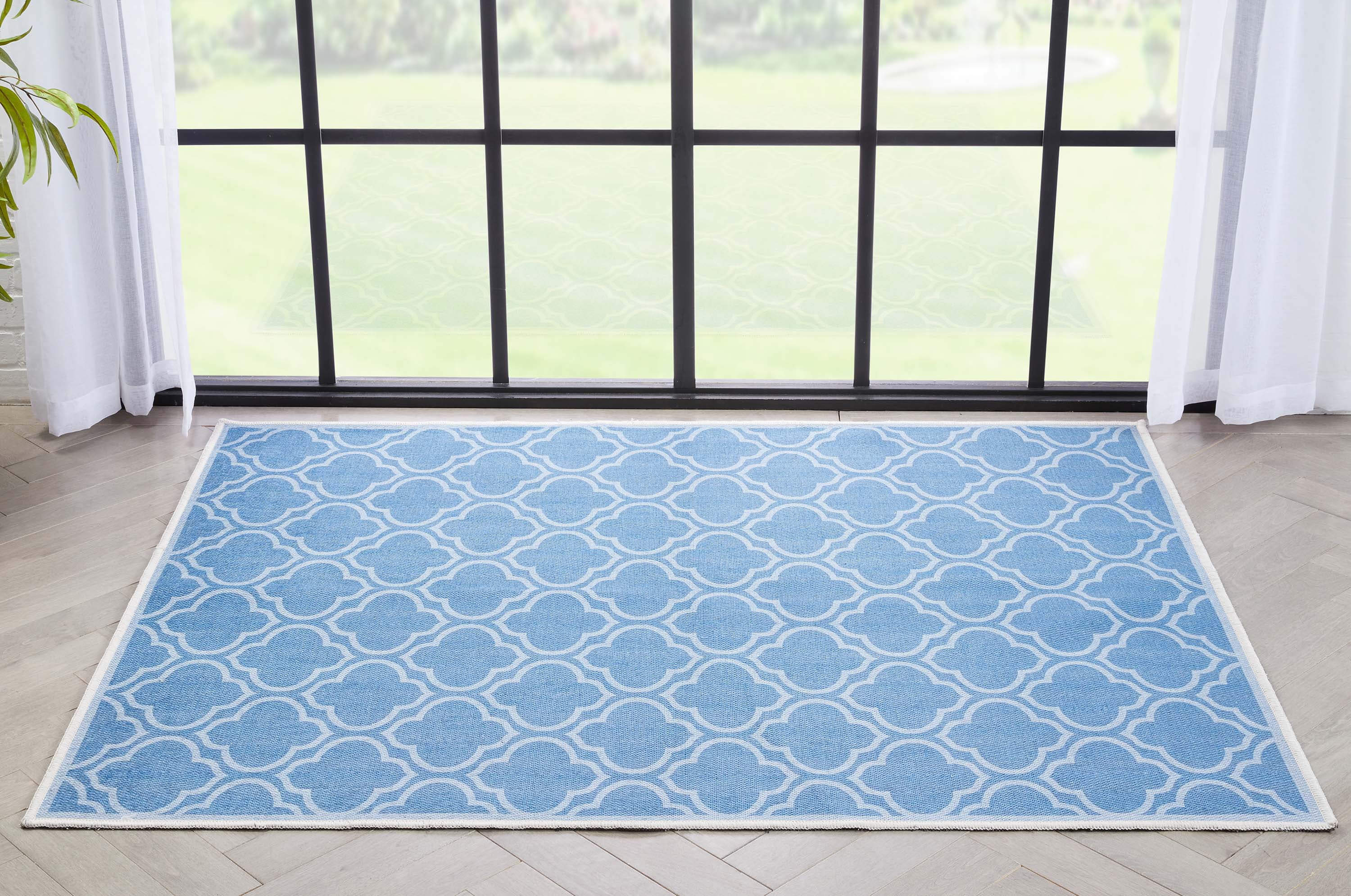 Apollo Soft Blue Chenille 63''x47'' Reversible Area Rug