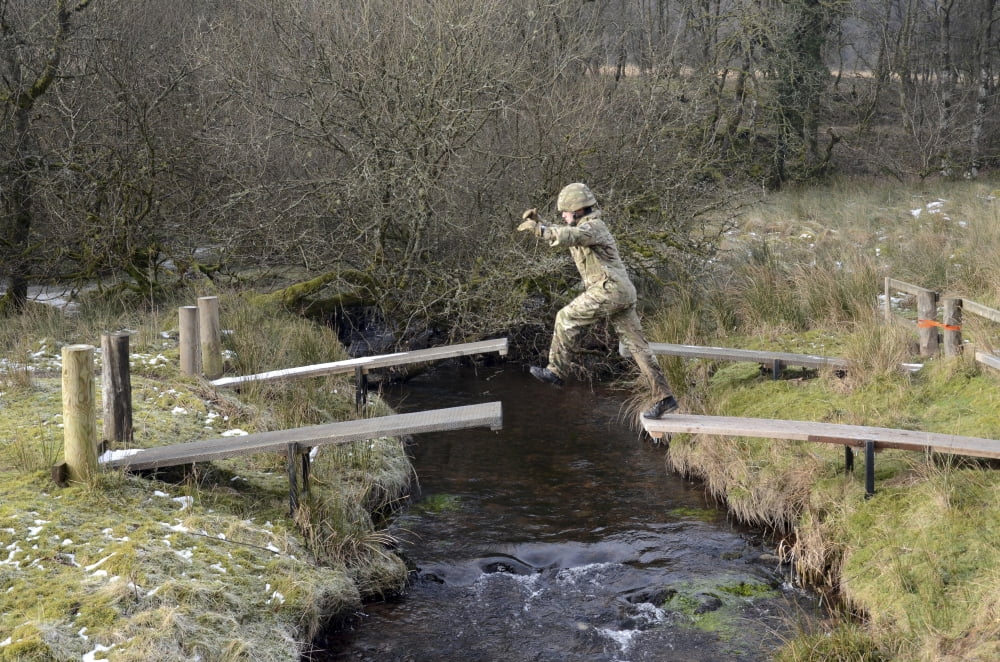 Welsh Guards perform basic training on the assault course at Sennybridge Training Area Canvas Art - Andrew ChittockStocktrek Images (18 x 12)
