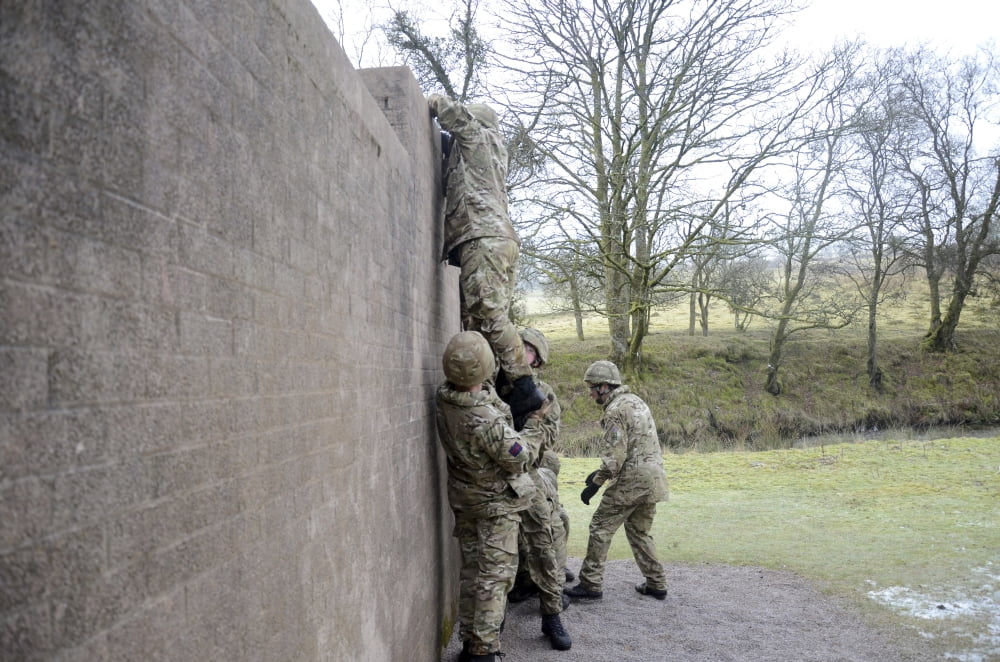 Welsh Guards perform basic training on the assault course at Sennybridge Training Area Canvas Art - Andrew ChittockStocktrek Images (35 x 23)