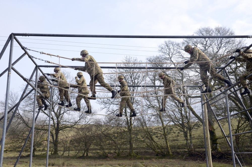 Welsh Guards perform basic training on the assault course at Sennybridge Training Area Canvas Art - Andrew ChittockStocktrek Images (35 x 23)