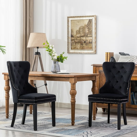 WestinTrends Wordford Velvet Dining Chairs Set of 2, Modern Wingback Upholstered Button Tufted Kitchen Dining Room Chairs with Solid Wood Legs and Pull Ring, Black