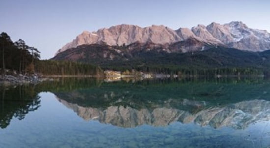 Wetterstein Mountains Zugspitze Mountain and Eibsee Hotel reflecting in Lake Eibsee Bavaria Germany Canvas Art - Panoramic Images (24 x 14)