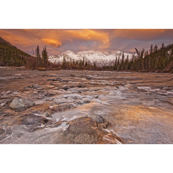 The Wheaton River In Early Winter With The Clouds Lit By Sunset Light Snow Covered Mountains Seen In The Distance Located Outside Of Whitehorse Yukon Canvas Art - Robert Postma Design Pics (34 x 22)