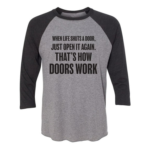 When Life Shuts A Door. . Open It Unisex 3/4 Sleeve Baseball Raglan Tee
