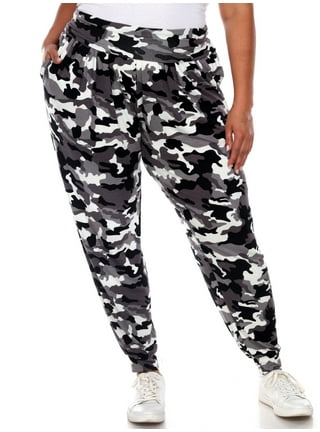 Overweight Fat Woman in Camouflage Pants and Sporting Bra Joggin