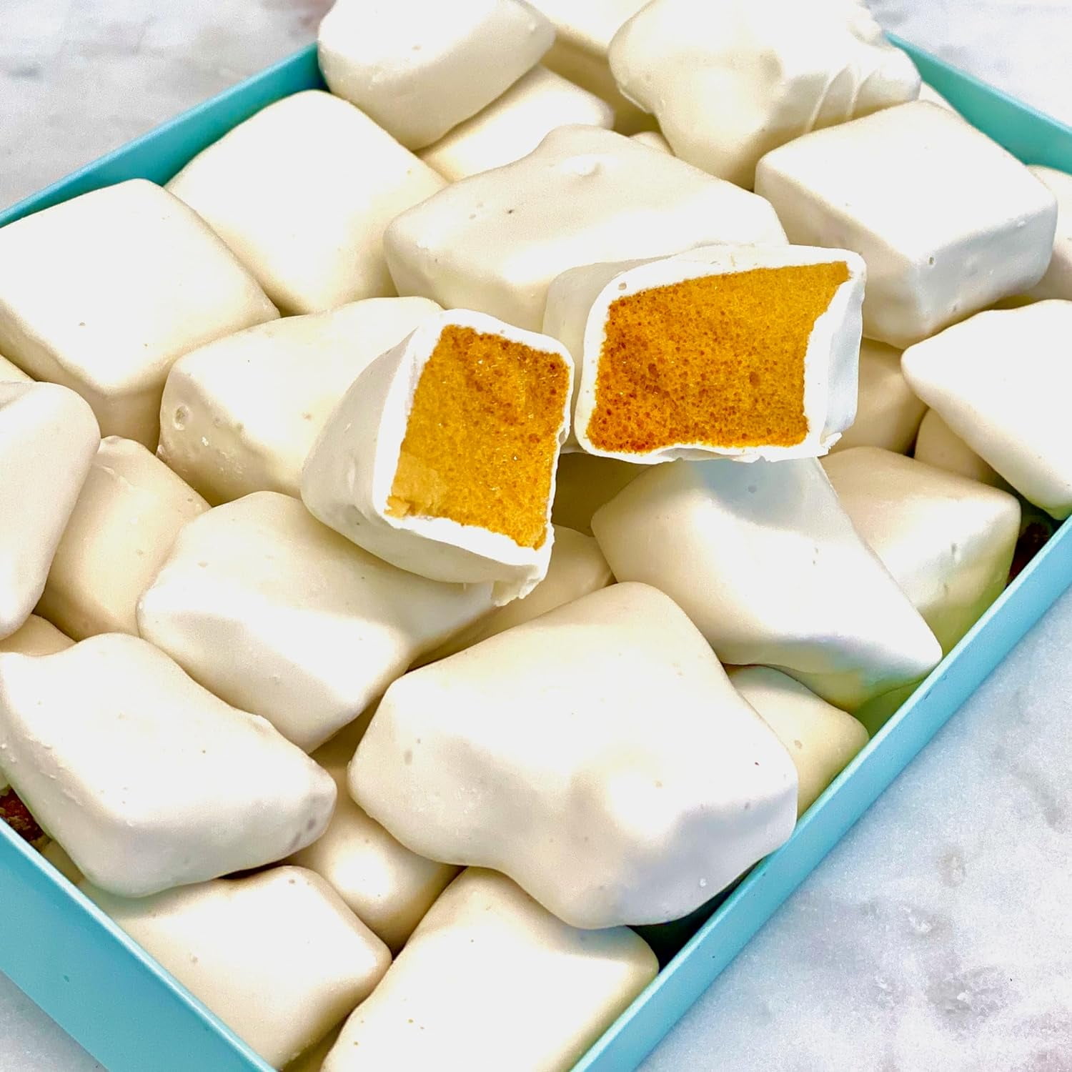 White chocolate sponge candy. Crunchie chunks of