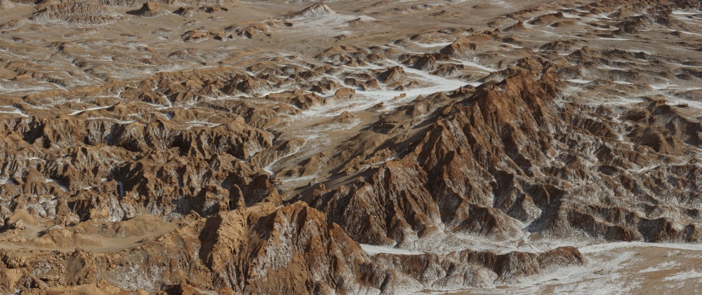 White is leeched out salts Valle Del Muerte Los Flamencos National Reserve San Pedro de Atacama Antofagasta Region Chile Canvas Art - Panoramic Images (36 x 12)