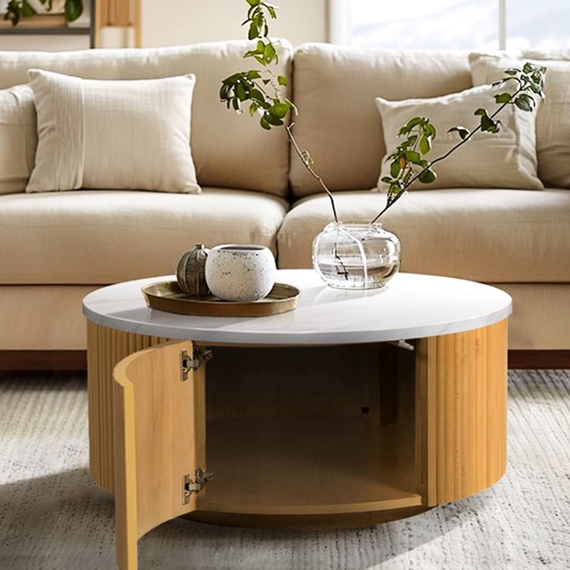 White marble finish - Opposite side door storage - Round coffee table ...