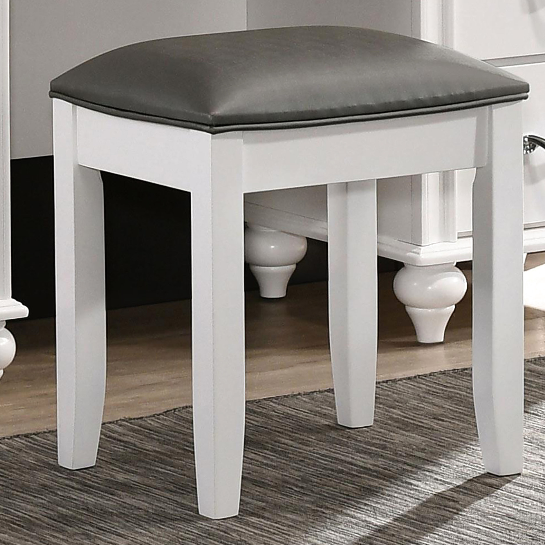 White vanity stool with turned legs and modern flair - Elevates the