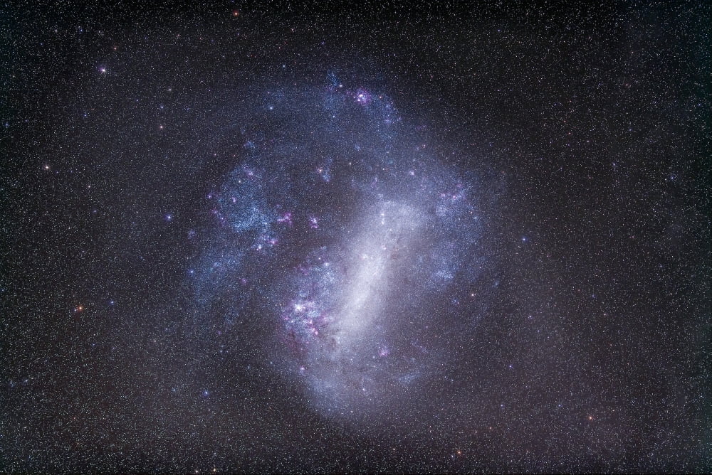Widefield view of the Large Magellanic Cloud Canvas Art - Alan DyerStocktrek Images (35 x 23)