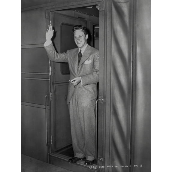 William Holden standing in Classic Suit with One Hand Raising Photo Print (24 x 30)