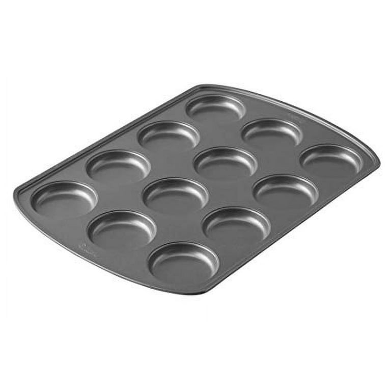 https://i5.walmartimages.com/seo/Wilton-Perfect-Results-Premium-Non-Stick-Bakeware-Muffin-Top-Baking-Pan-Enjoy-Best-Part-Muffin-Also-Great-Eggs-Corn-Bread-More-12-Cavities_e74ed519-e513-4c96-bd6d-ebfe767c5ad2.43763134231a74a0fc09aae450228f50.jpeg?odnHeight=768&odnWidth=768&odnBg=FFFFFF
