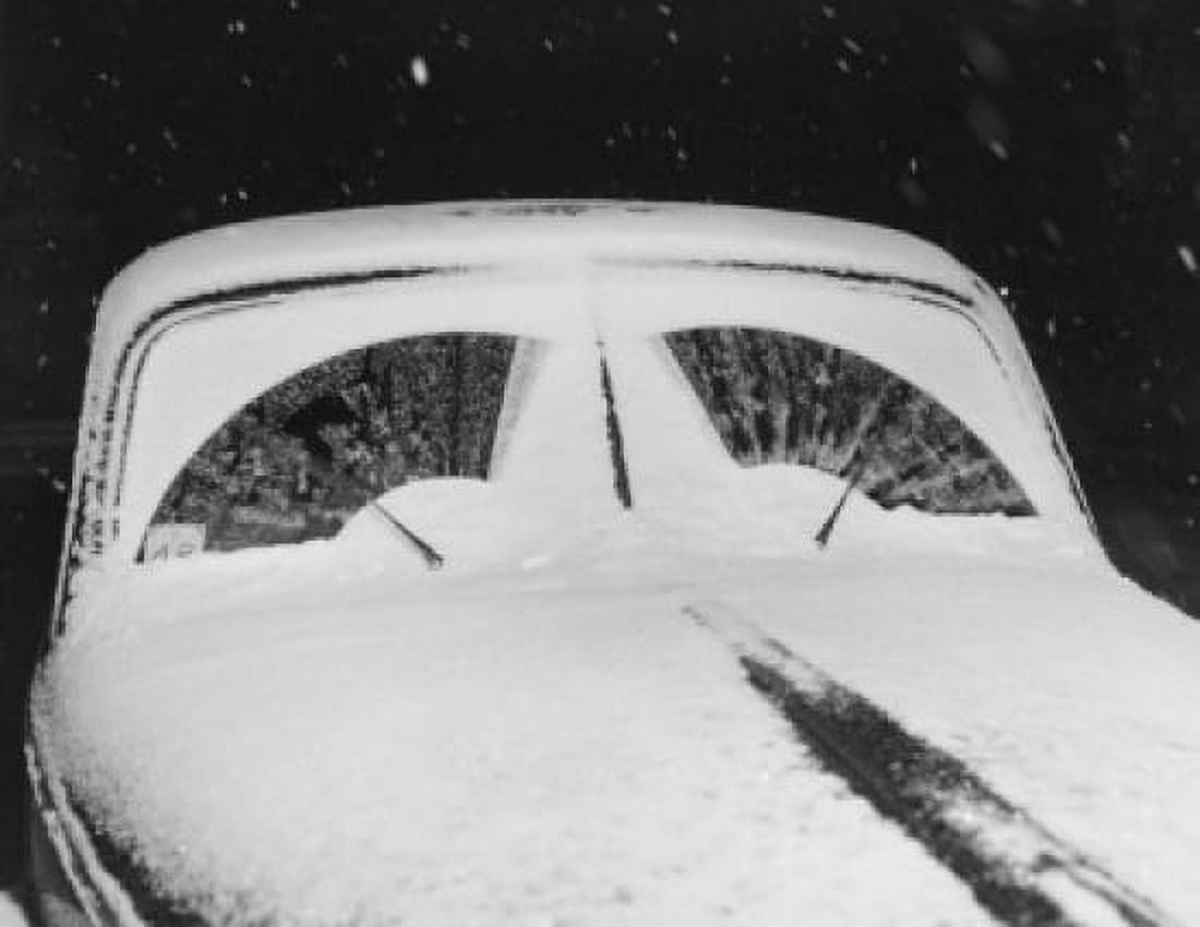 Wind shield wipers in motion clearing snow from wind shield Canvas Art - (24 x 36)