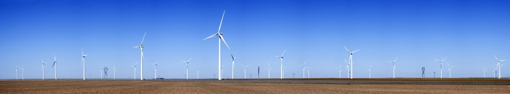 Wind turbines in a field against blue sky Kansas City Jackson County Missouri USA Canvas Art - Panoramic Images (66 x 12)