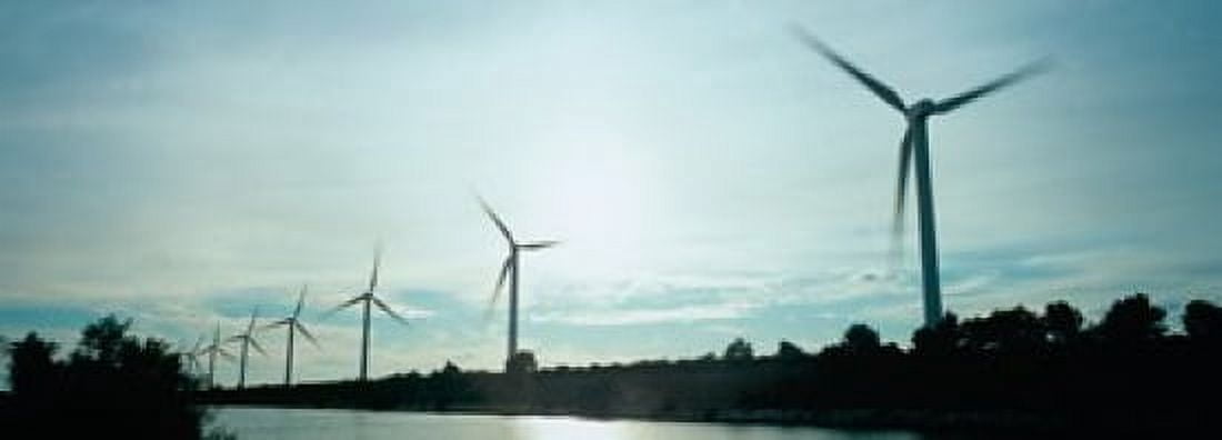 Wind turbines in motion at dusk Provence-Alpes-Cote dAzur France Canvas Art - Panoramic Images (36 x 13)