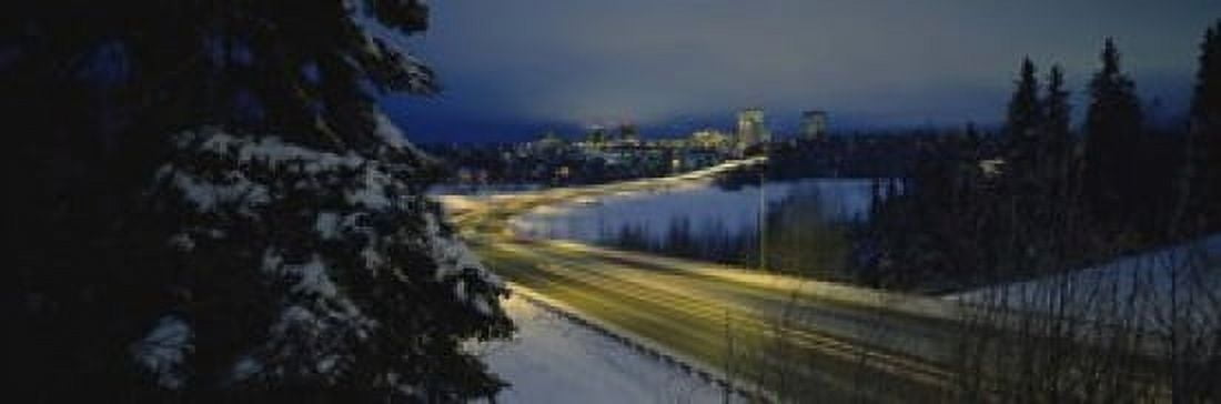 Winding road running through a snow covered landscape Anchorage Alaska USA Canvas Art - Panoramic Images (18 x 6)