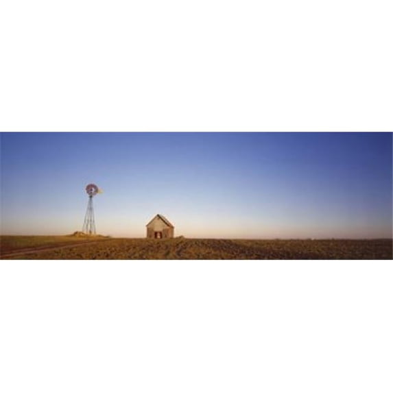 Windmill in a field near a farmhouse Illinois USA Poster Print by - 36 x 12