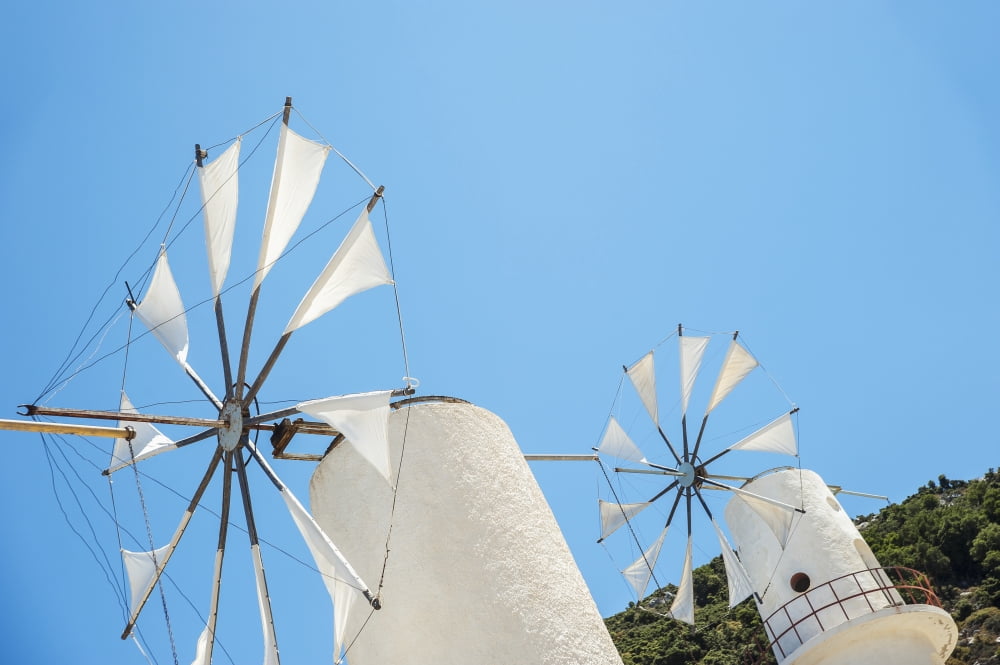 Windmills against a blue sky Lasithi Plateau Crete Greece Canvas Art - Dosfotos Design Pics (38 x 24)