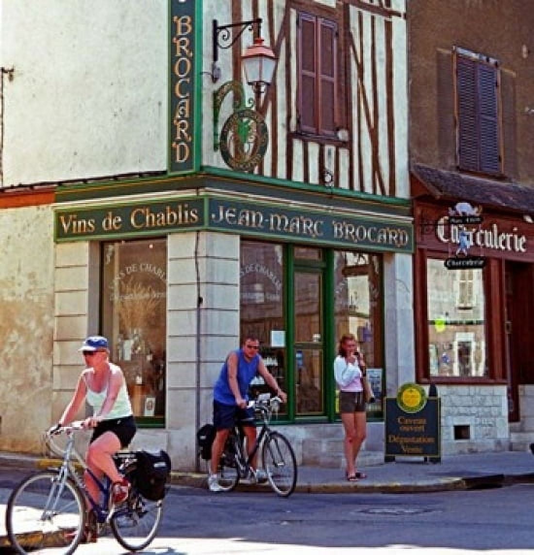 Wine Shop and Cycling Tourists Chablis France Canvas Art - Per Karlsson DanitaDelimont (30 x 32)
