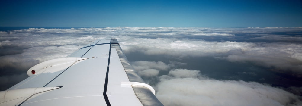 Wing of an airplane Canvas Art - Panoramic Images (36 x 12)