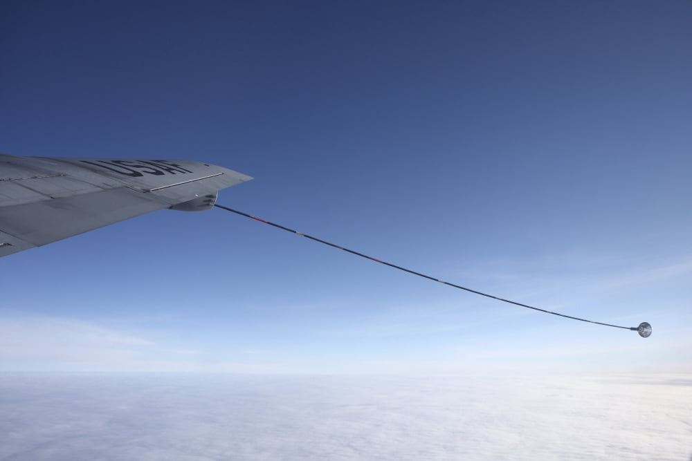 Wing refueling hose of a US Air Force KC-135 Stratotanker Canvas Art - Daniel KarlssonStocktrek Images (18 x 12)