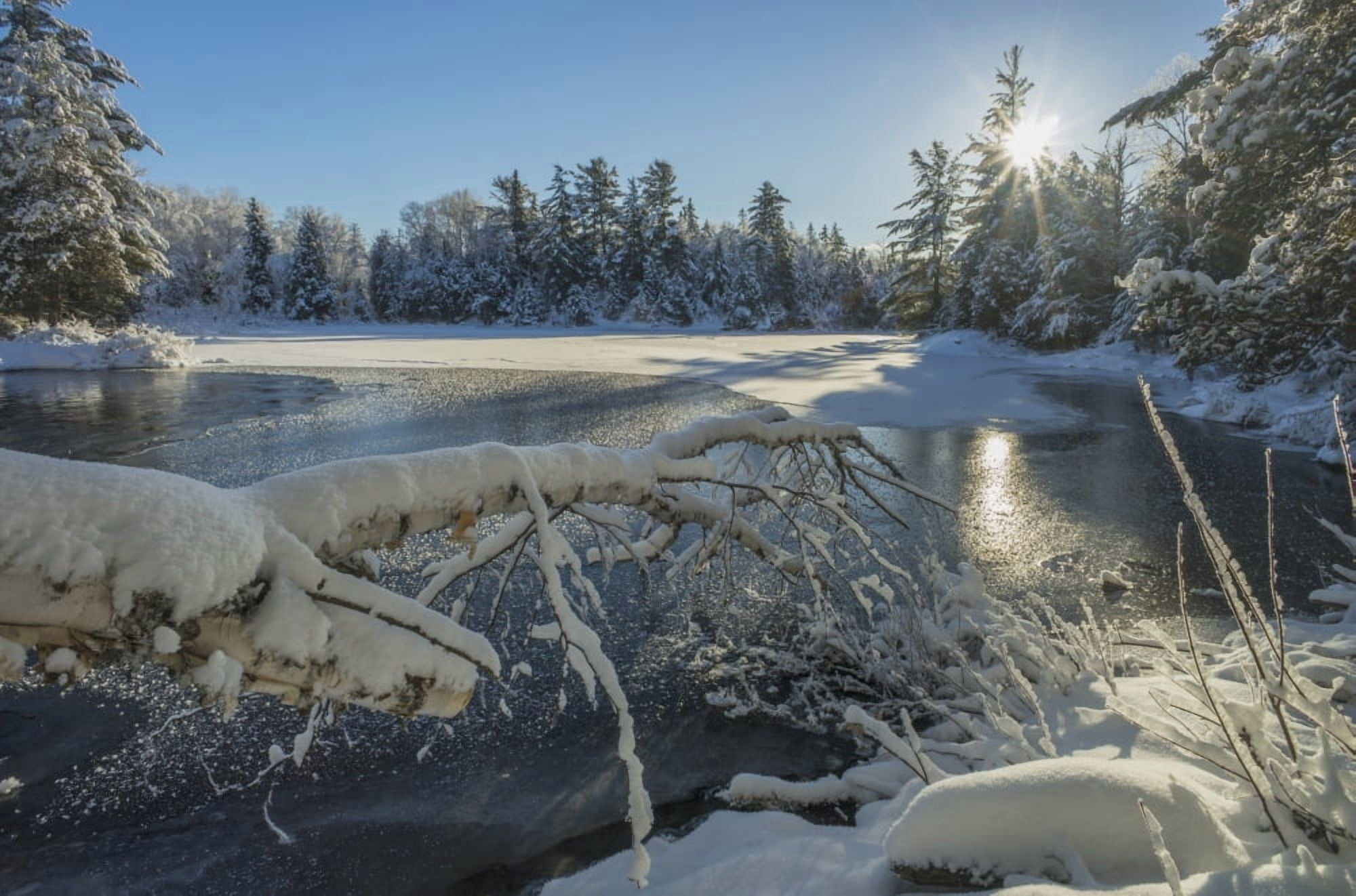 Winter landscape with ice on a lake Ontario Canada Canvas Art - Julie DeRoche Design Pics (38 x 24)