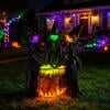 Witch Yard Stake Set with Weatherproof Fabric and LED Lights, Halloween Decoration for Three Witch Figurines, Easy Assembly, Versatile for Lawns, Porches, and Outdoor Holiday Displays.