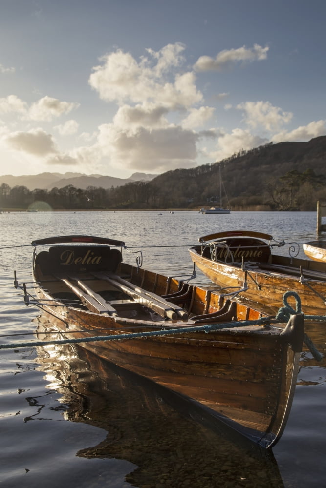 Woden boats tied at the waters edge on a tranquil lake South Lakeland District England Canvas Art - John Short Design Pics (24 x 38)