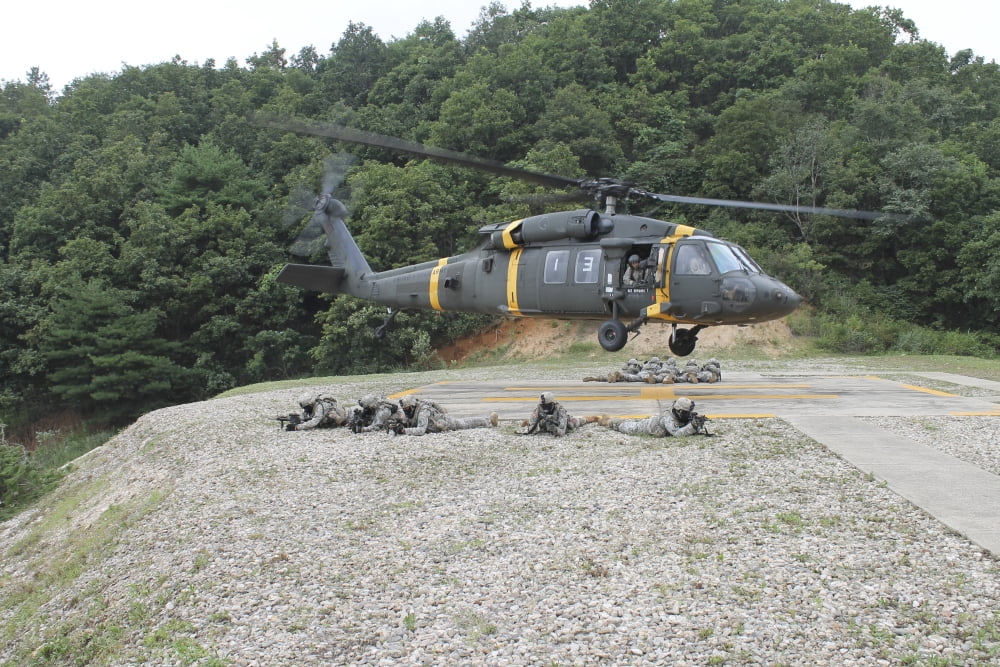 Wolfhounds air assault from a UH-60 Blackhawk helicopter Canvas Art - Stocktrek Images (35 x 23)