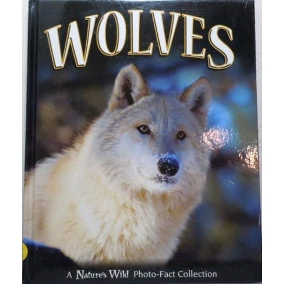 Pre-Owned Wolves: A Nature's Wild Photo-Fact Collection (Other) 9781588653536