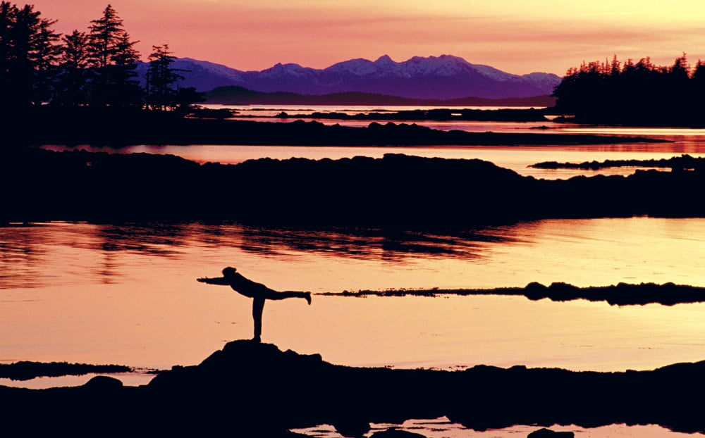 Woman Doing Yoga On A Rocky Beach Duke Island Southeast Alaska Canvas Art - Chip Porter Design Pics (34 x 22)