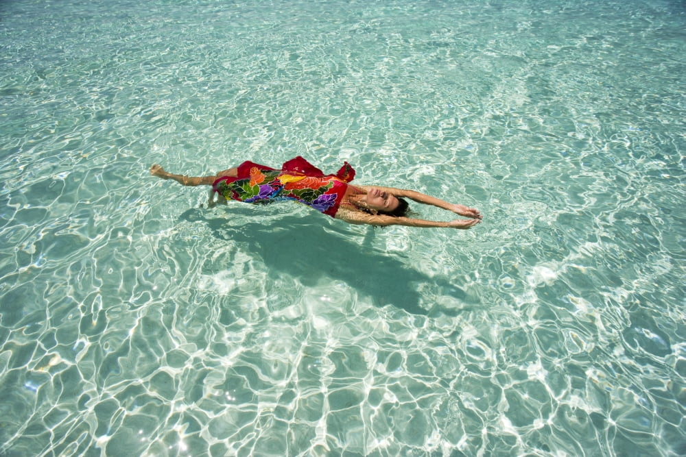 Woman Floating In Tropical Ocean Water Canvas Art - M Swiet Productions Design Pics (18 x 12)