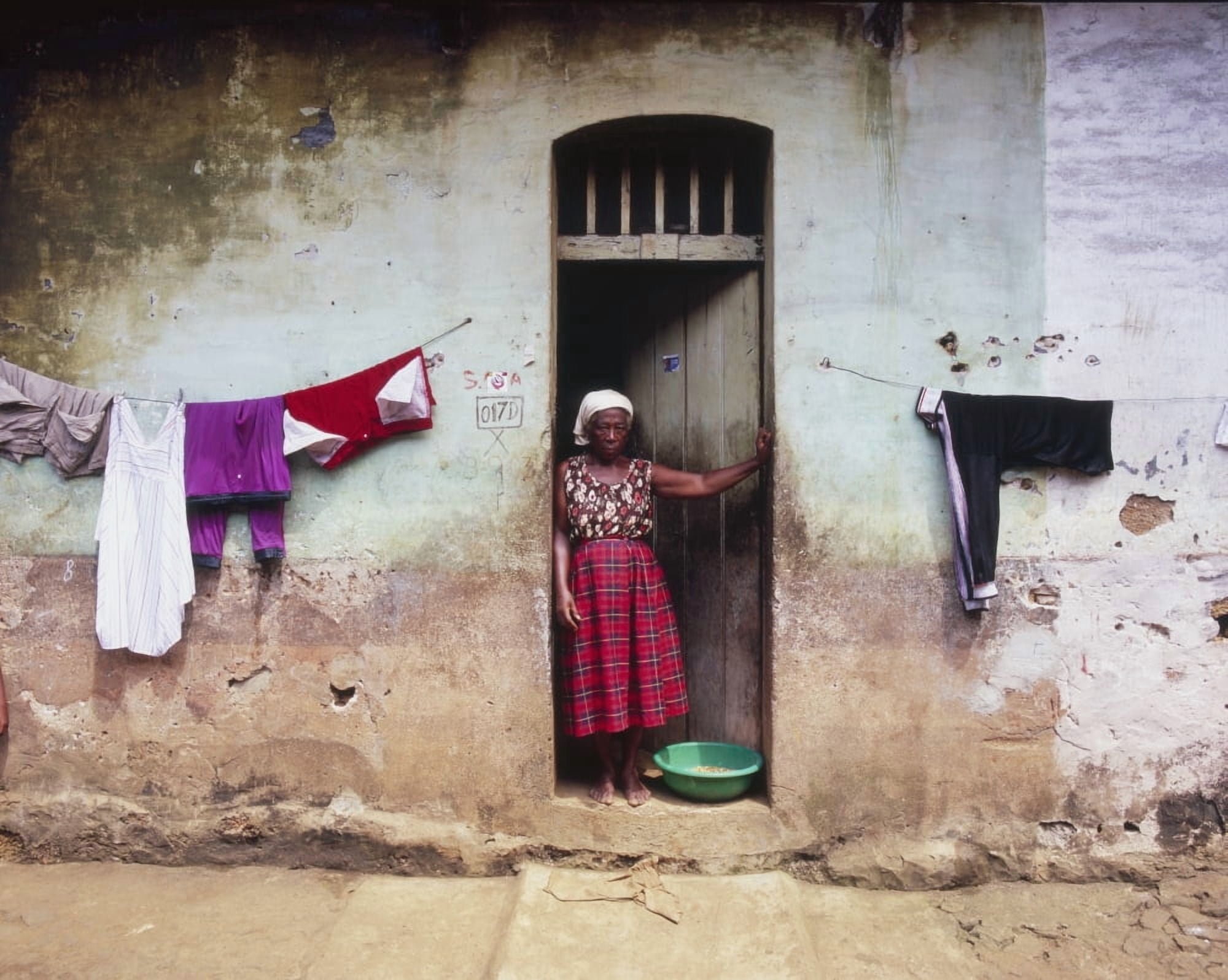 Woman In Front Of The House Democratic Republic Of Sao Tome And Principe Canvas Art - Henning Marstrand Design Pics (34 x 26)