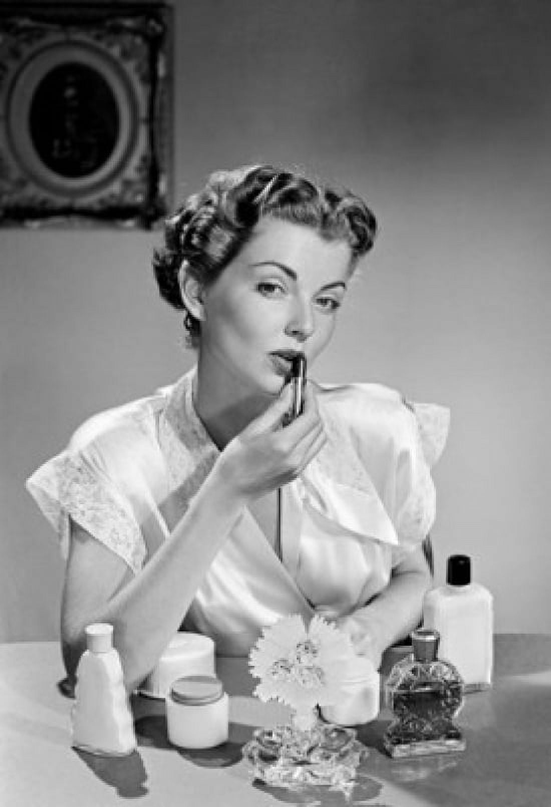 Woman applying make-up Canvas Art -  (18 x 24)