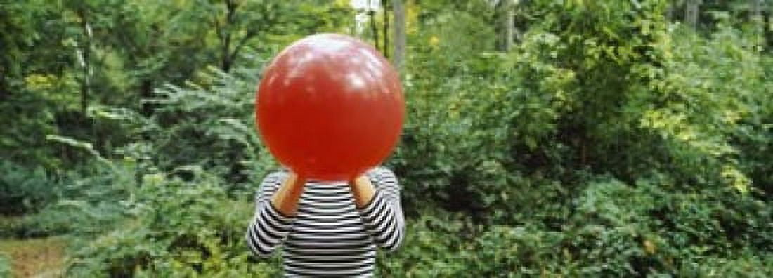 Woman blowing a balloon Germany Canvas Art - Panoramic Images (18 x 7)