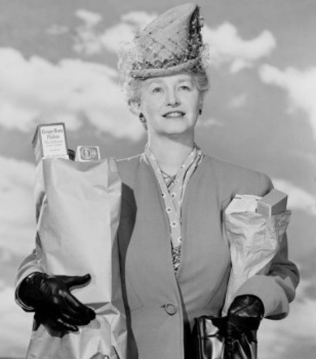 Woman carrying grocery bags outdoors Canvas Art - (18 x 24)