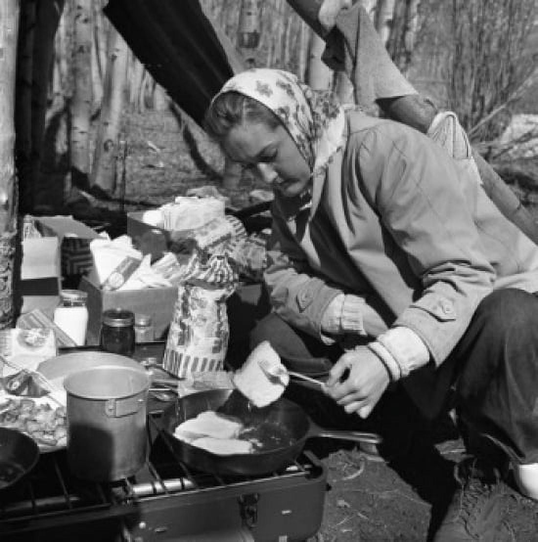 Woman cooking outdoors Canvas Art - (24 x 36)