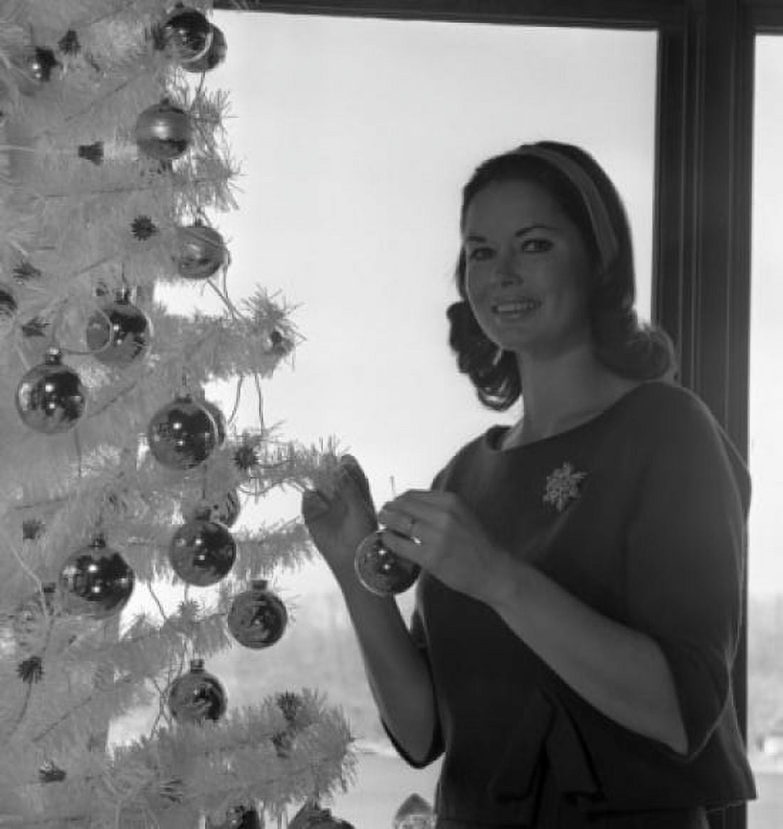 Woman decorating Christmas tree Canvas Art -  (24 x 36)