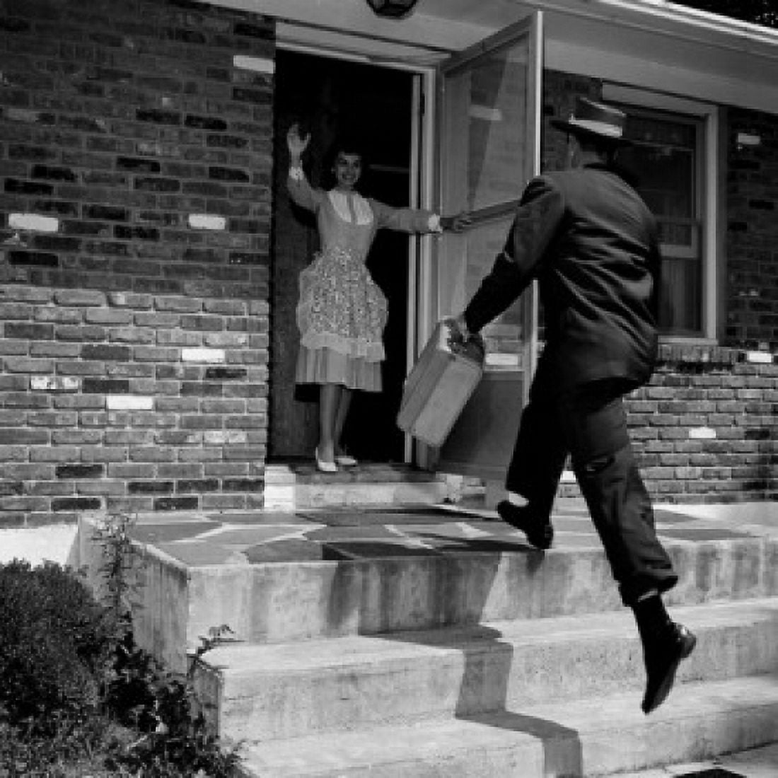 Woman greeting husband at front door Canvas Art - (24 x 36)