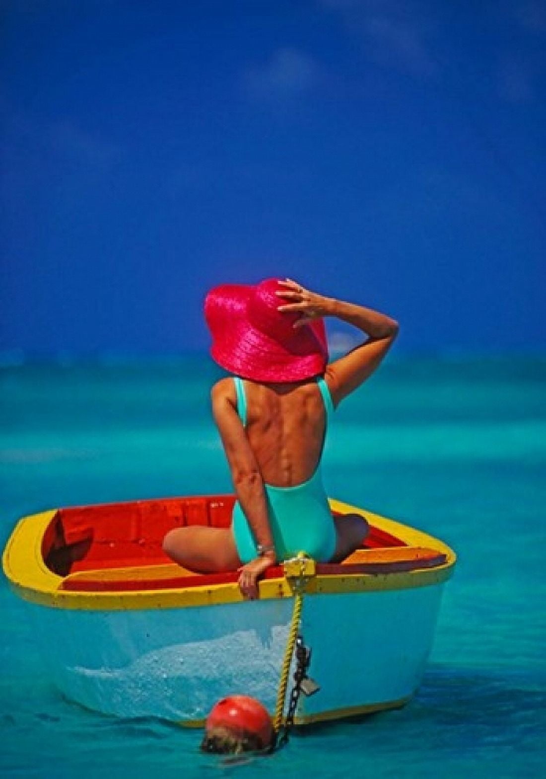 Woman in Boat with Pink Straw Hat Caribbean Canvas Art - Greg Johnston DanitaDelimont (24 x 36)
