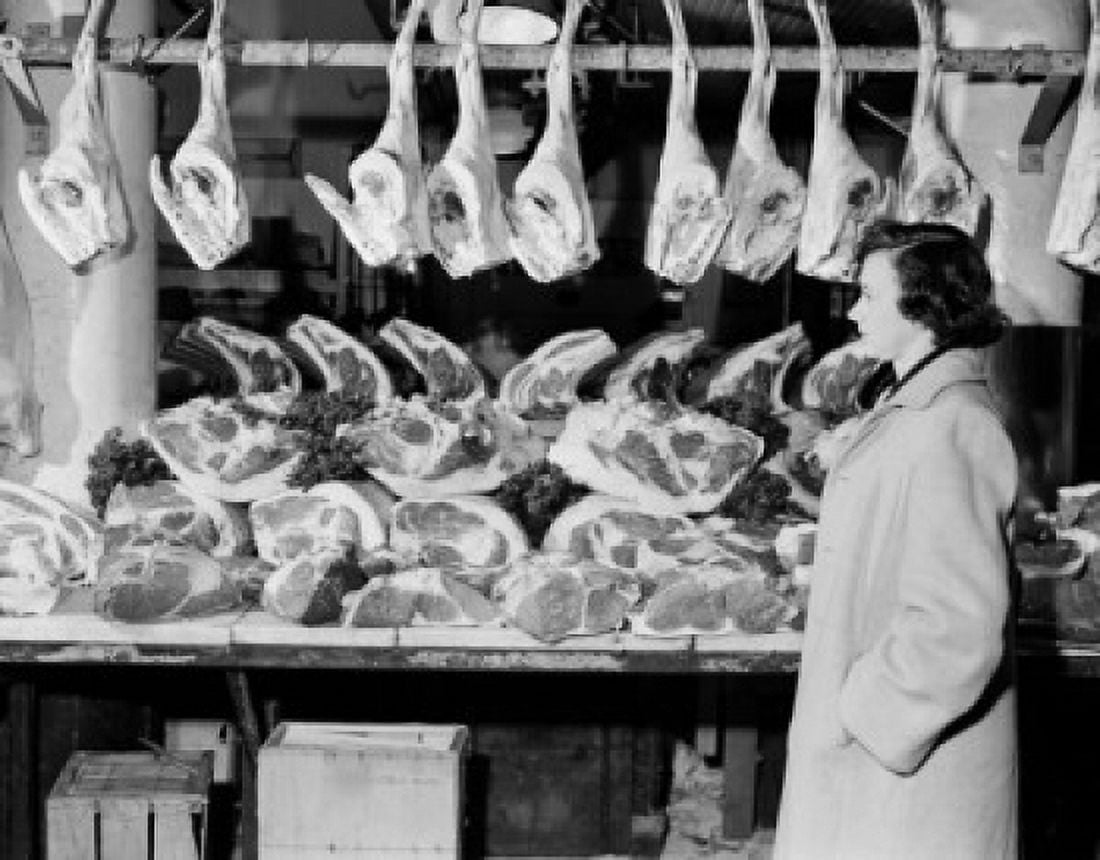 Woman in butchers shop Canvas Art - (18 x 24)