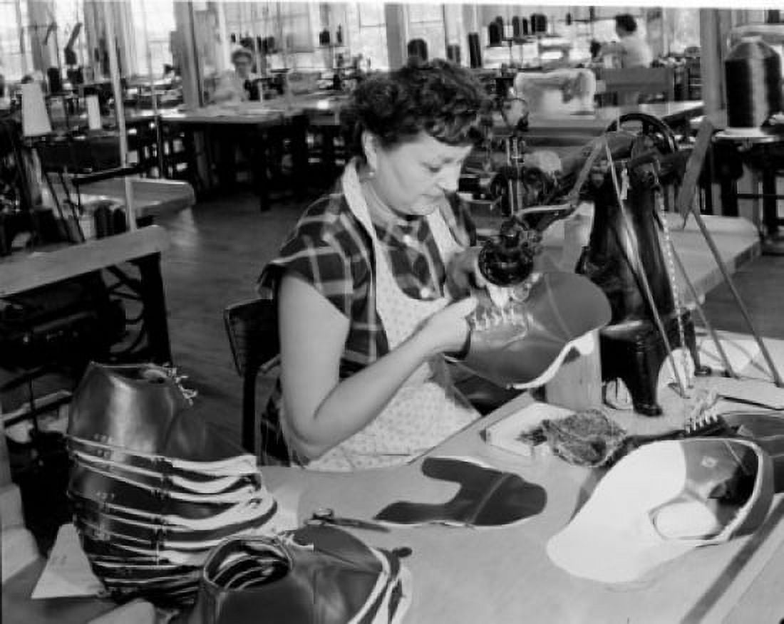 Woman in factory sewing shoe Canvas Art - (18 x 24)
