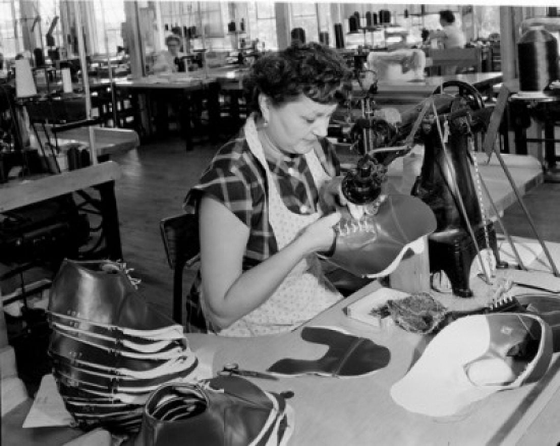 Woman in factory sewing shoe Canvas Art - (24 x 36)