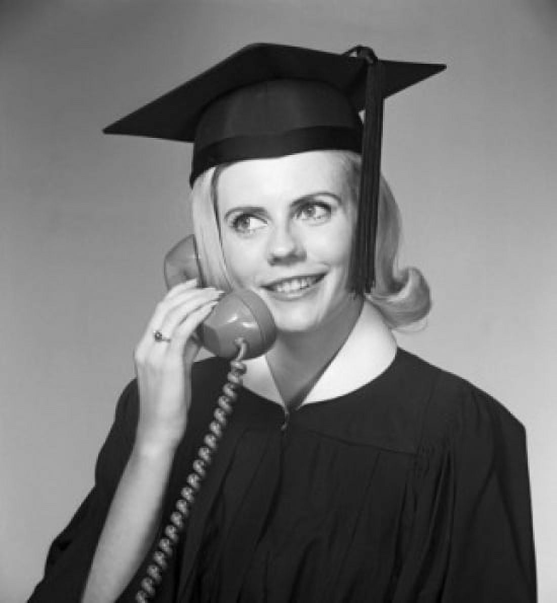 Woman in mortar board talking on phone Canvas Art - (24 x 36)