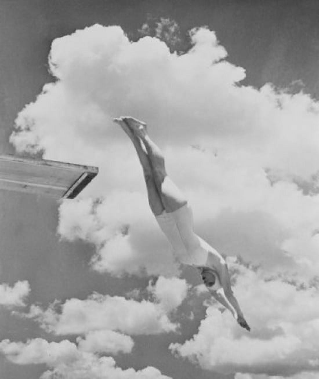 Woman jumping from springboard Canvas Art - (24 x 36)