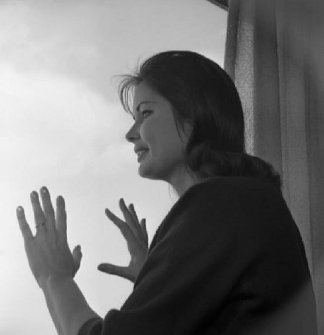 Woman looking through window Canvas Art - (24 x 36)